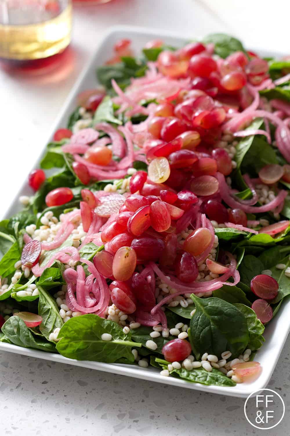 Spinach Salad with Barley with Grapes and Pickled Onions