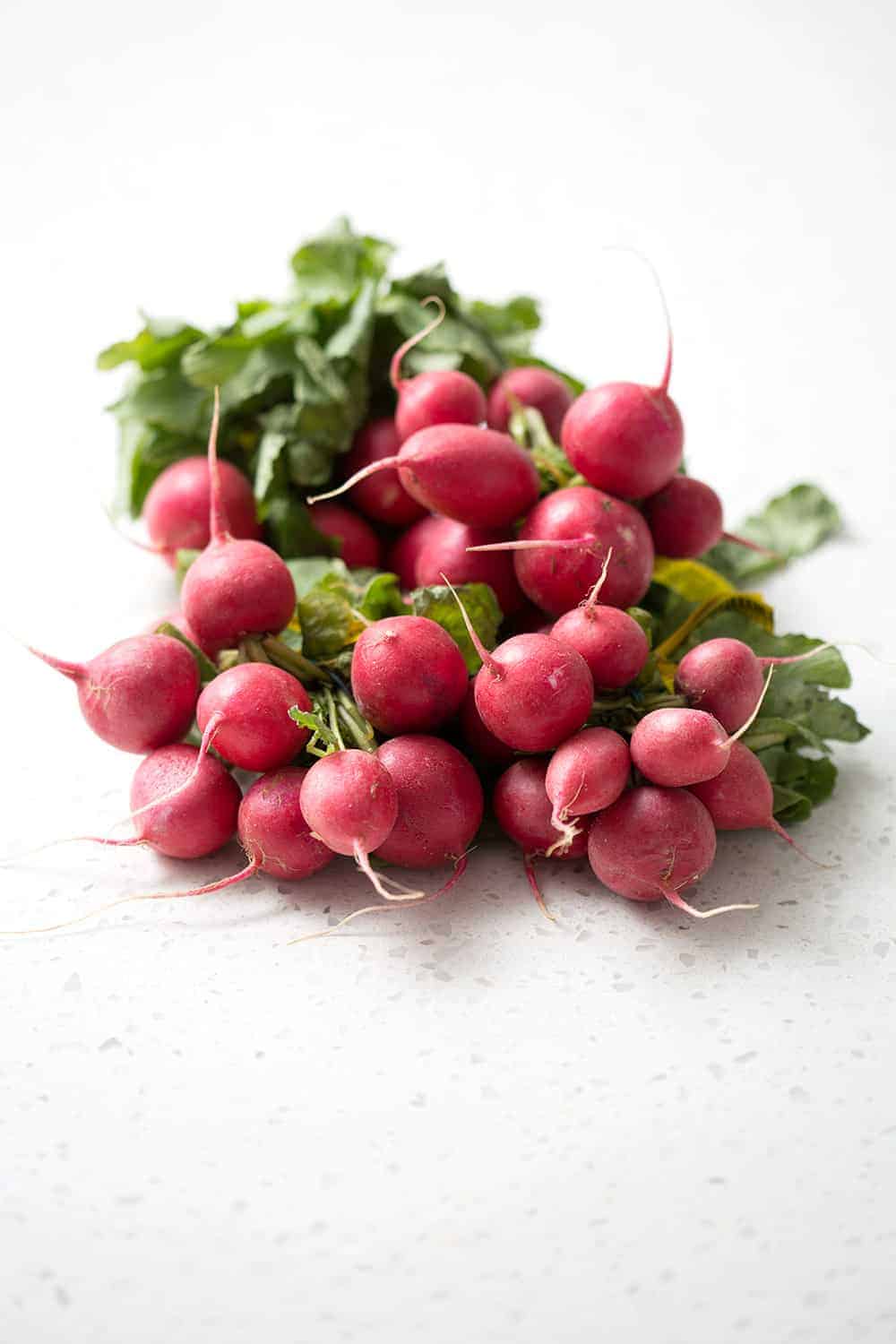 Fresh radishes ready for roasting.