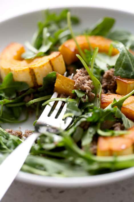 Roasted-Squash-and-Beef-Arugula-Salad-55sm A nutrient dense fall salad that healthy and delicious. The bonus is that this recipe is super easy. You don’t even have to peel the squash, as it’s totally edible! This recipe is allergy friendly (gluten, dairy, shellfish, nut, egg, and soy free) and suits the autoimmune protocol (AIP) and paleo diets.