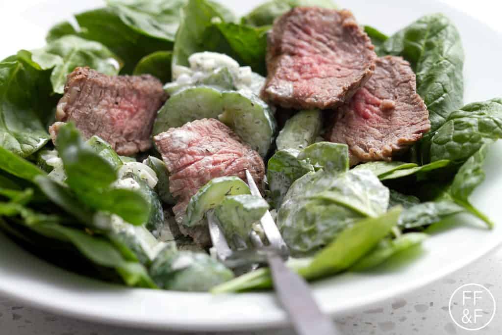 This Tri Tip Spinach Salad with a Creamy Cucumber Dill Dressing recipe can be used with cold, leftover tri tip or hot, right off the grill. You can also make the dressing up to a day in advance so all you need to do is assemble for dinner. Either way, it’s delicious. This recipe is allergy friendly (gluten, dairy, shellfish, nut, egg, and soy free) and suits the autoimmune protocol and paleo diets.