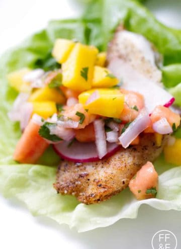 Tilapia Lettuce Wraps with Mango Papaya Salsa are a fresh and healthy dinner that requires very little cooking. This recipe is great for gluten free, dairy free and autoimmune protocol (AIP) diet.