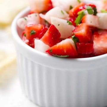 This is a nightshade free Strawberry Salsa recipe for a naturally sweet and tangy topping or dip. This recipe is allergy friendly (gluten, dairy, shellfish, nut, egg, and soy free) and suits the autoimmune protocol (AIP), paleo and vegan diets.