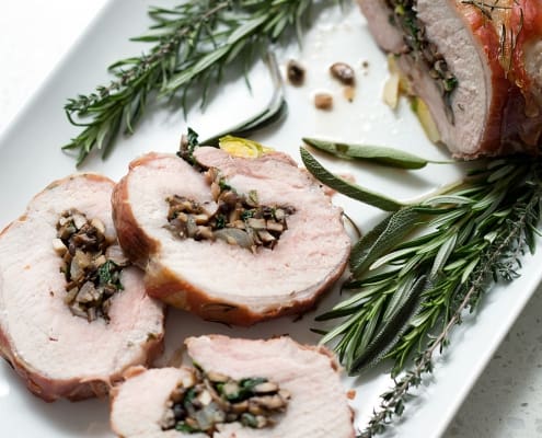 This Prosciutto Wrapped Pork Roast with Brussel Sprouts recipe is pork roast stuffed with savory mushrooms, onions and herbs then wrapped in salty prosciutto and fished off with brussel sprouts. It’s a complete meal in one dish. This recipe is allergy friendly (gluten, dairy, shellfish, nut, egg, and soy free) and suits the AIP and Paleo diets.