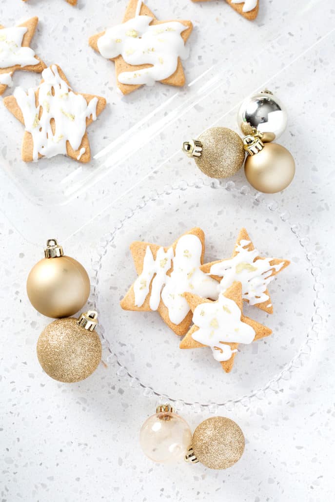 These AIP Christmas Cookies are the perfect paleo cutout cookies to make with your kids this holiday season. Or you can just save these elegantly decorated AIP cookies for yourself.