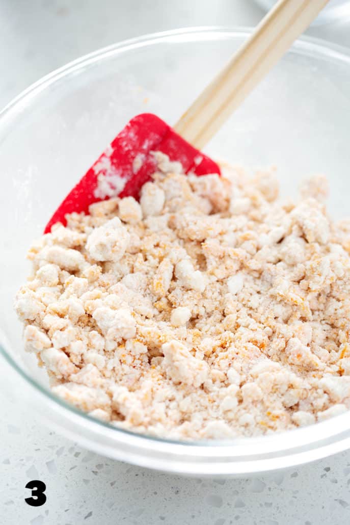 spatula in bowl of dough meant for AIP Pizza dough