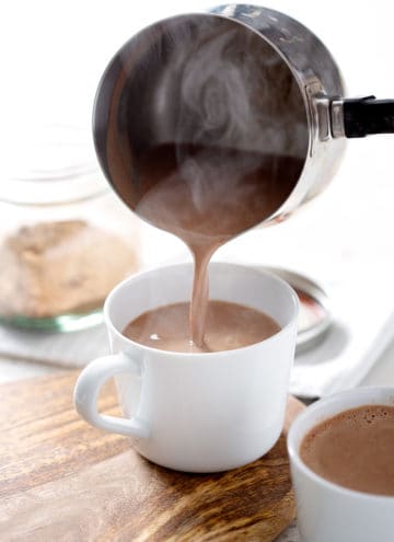 pouring AIP Hot 'Chocolate' into mug with steam