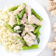 plate of AIP Ginger Chicken and Asparagus Stir Fry with rice