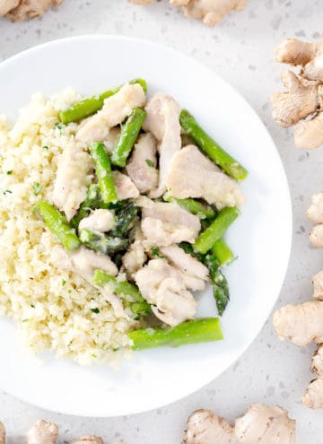 plate of AIP Ginger Chicken and Asparagus Stir Fry with rice