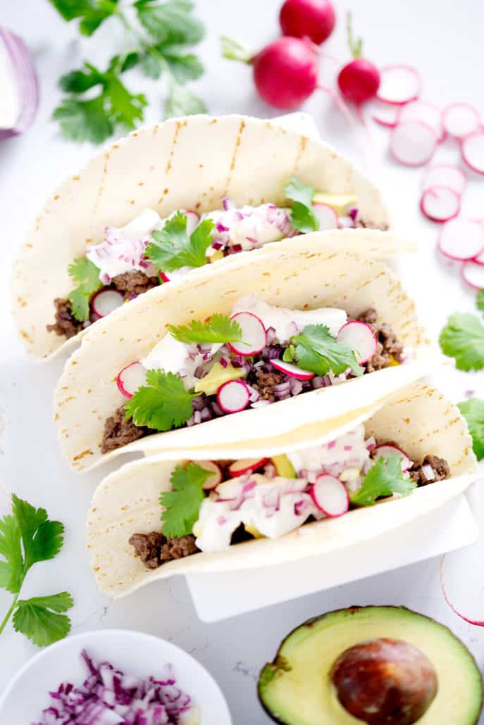 AIP Tacos surrounded by toppings