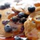 close up of AIP Blueberry Pancakes with maple syrup