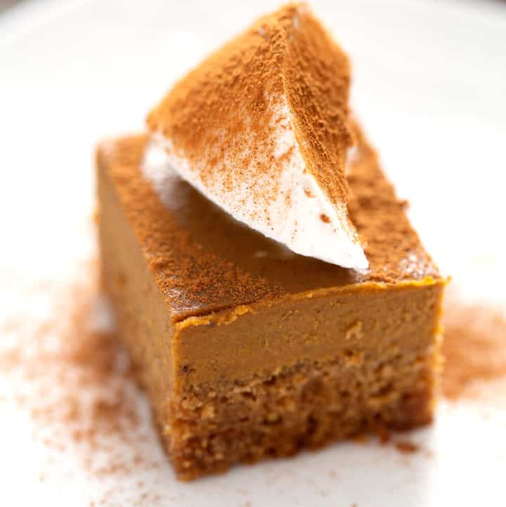 AIP Pumpkin Pie Bars with topping on white plate