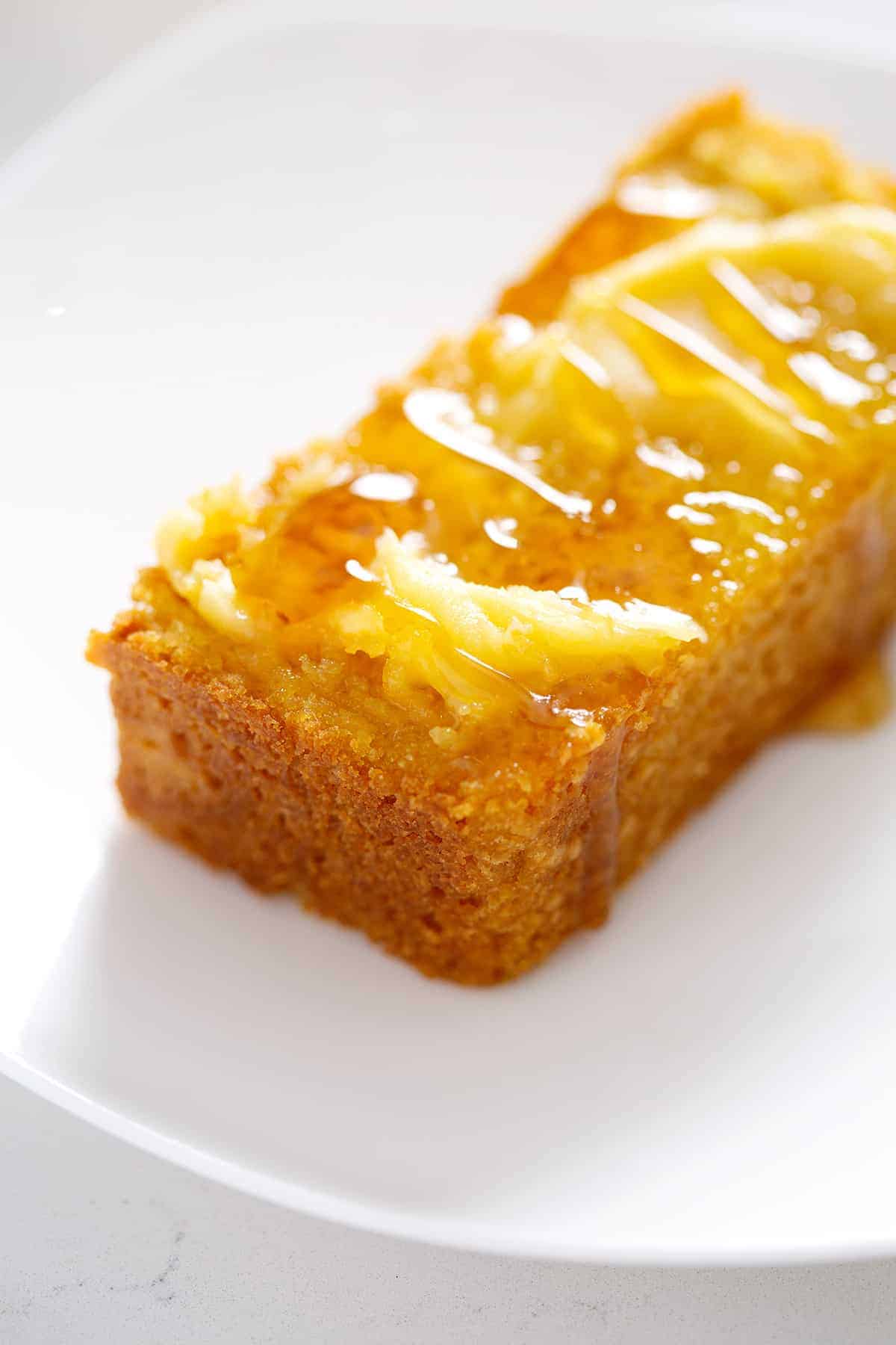 piece of Paleo Cornbread with butter and honey